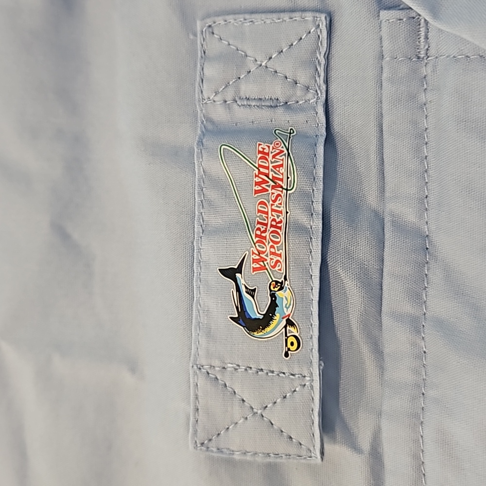 NWT- World Wide Sportsman Men's XL Long-Sleeved Blue Button Down Shirt.